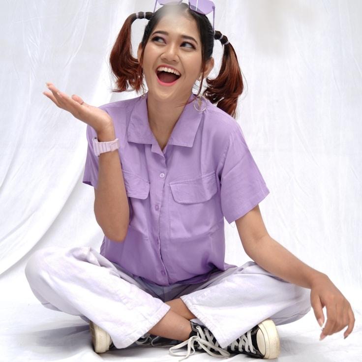 Anya Rao, Lead Design Curator at Brook Field Lumen, reviewing corporate floral arrangements